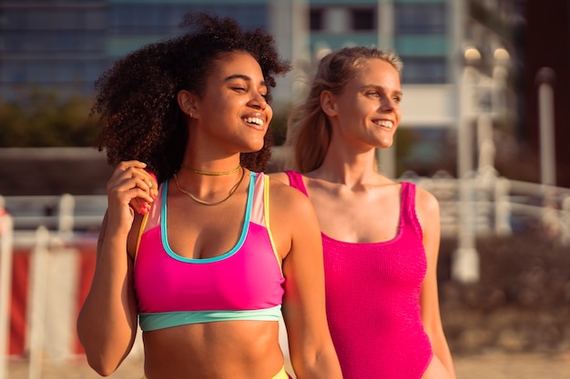 Women enjoying 80s summer aesthetics