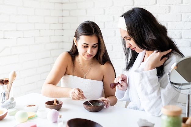 Photo women hands making facial mask doing spa procedures