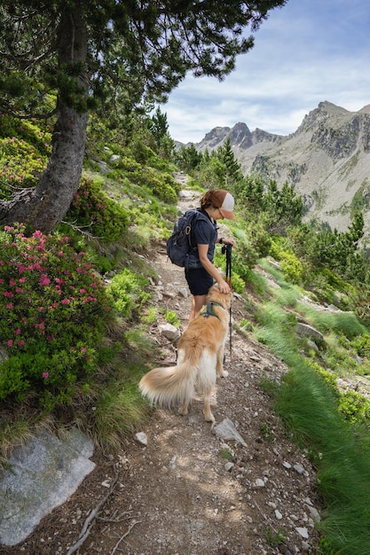 Women hiker adventurous dog