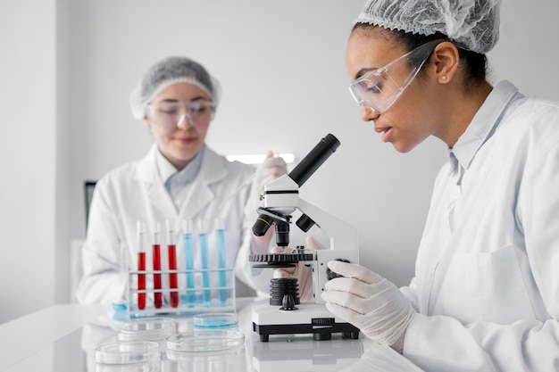 Women in laboratory doing experiments