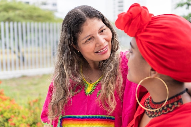 Women multiethnic Meet Outdoor And Talk