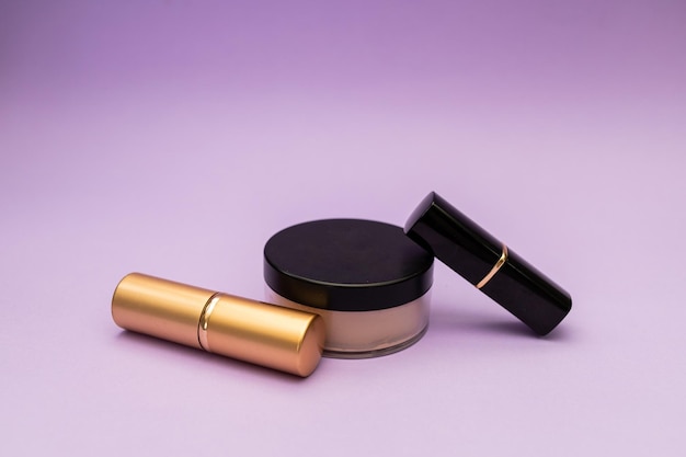 Women's cosmetics on a purple background