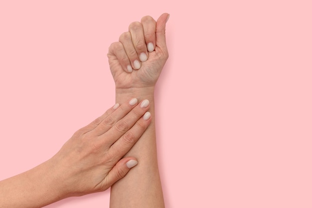 Women's hands with a beautiful manicure Treatment and spa care for the skin of hands and nails