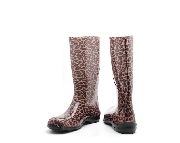 Women's rubber boots with leopard patterns on an isolated white background