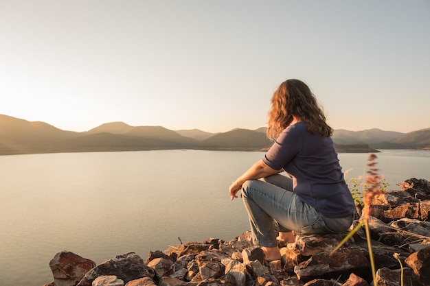 a women sitting alone