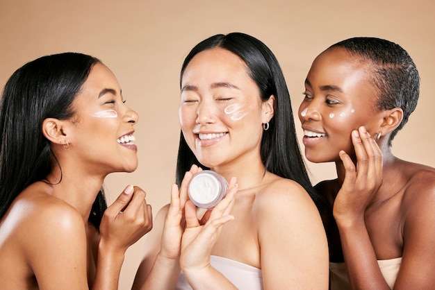 Women skincare cream and beauty friends with diversity for dermatology or cosmetic container Asian and black people group happy about skin glow spa facial and face advertising self care product