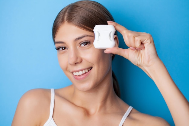 Women use dental floss white healthy teeth