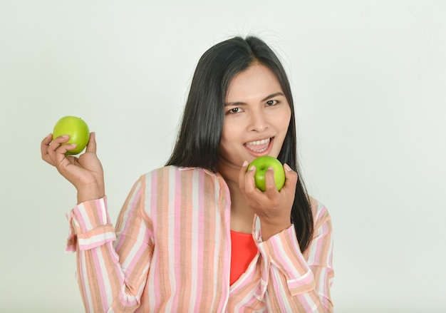 Women with bright and apples  in hand 