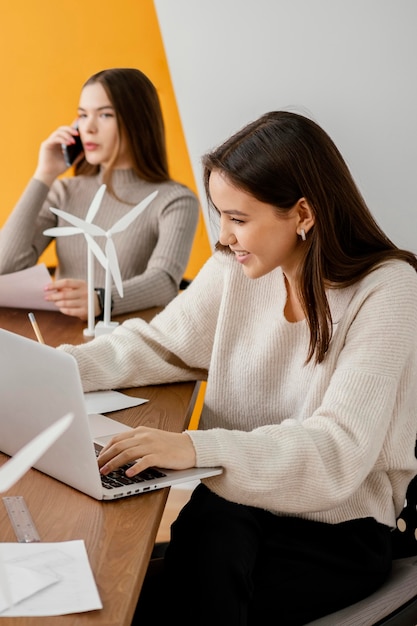 Women working on renewable energy project