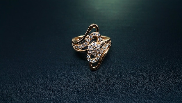 womens gold ring with royal carved motifs