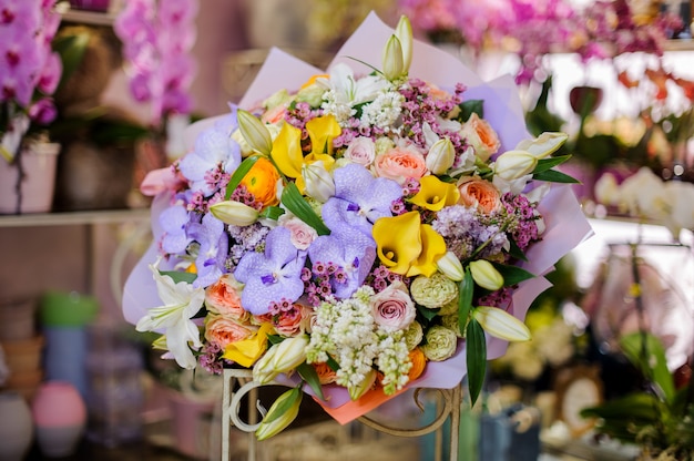 Wonderful bouquet of a violet, white, pink and yellow flowers