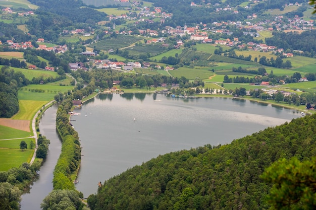 Wonderful lake in the green nature with houses above