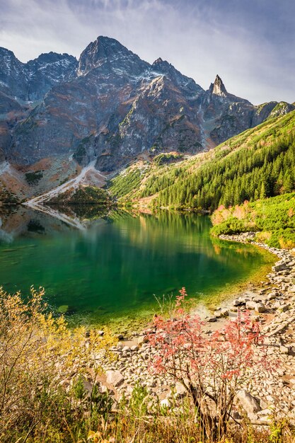 Wonderful sunrise at lake in the Tatra Mountains in autumn