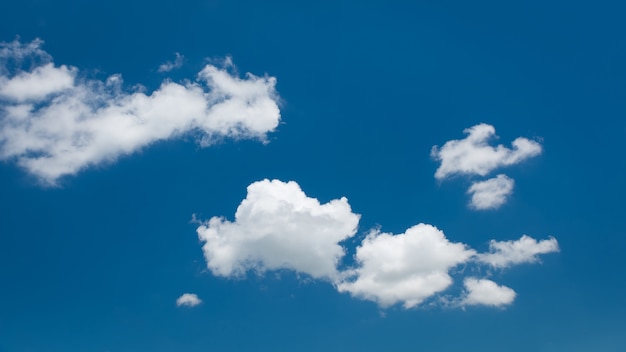 Wonderful white cumulus clouds on blue sky