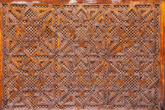 Wood carving of geometry islamic pattern Morocco