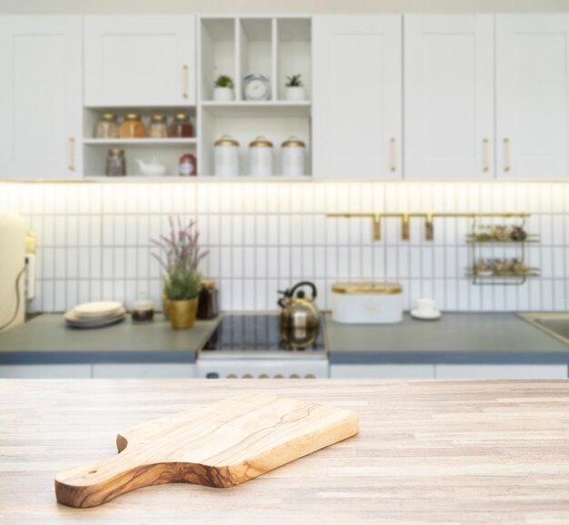 Wood counter top on blur kitchen background For montage product display or key visual layout