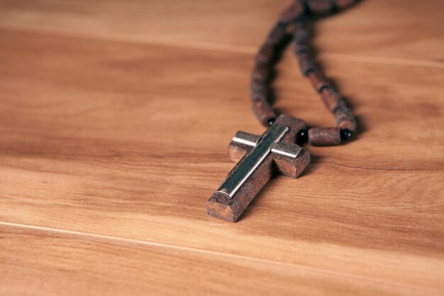 Wood cross on wood table