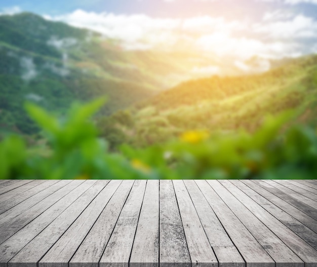 Wood desk or wood floor for product display with mountain view background