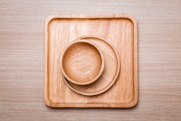 Wood dish on the wooden background. 