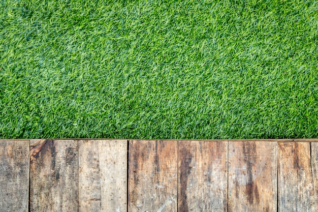 Wood floor on artificial grass texture