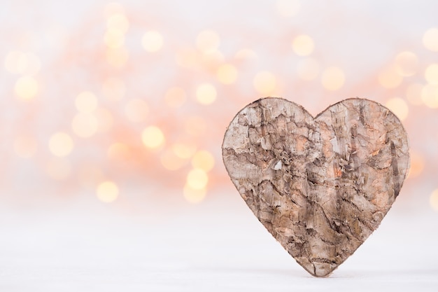 The wood Heart shapes on abstract light in love concept for Valentines day.