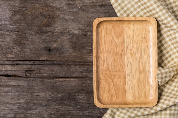 Wood plate on wooden background