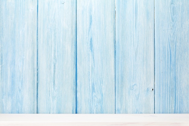 Wood shelf in front of wooden wall