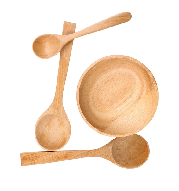 Wood spoon and wood bowl on white background.top view