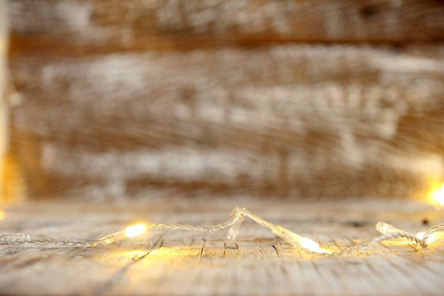 Photo wood table and blur abstract bokeh light background