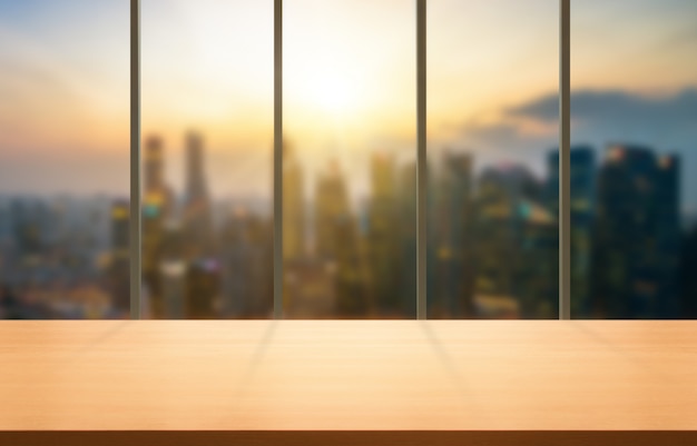 Wood table in city center modern office background