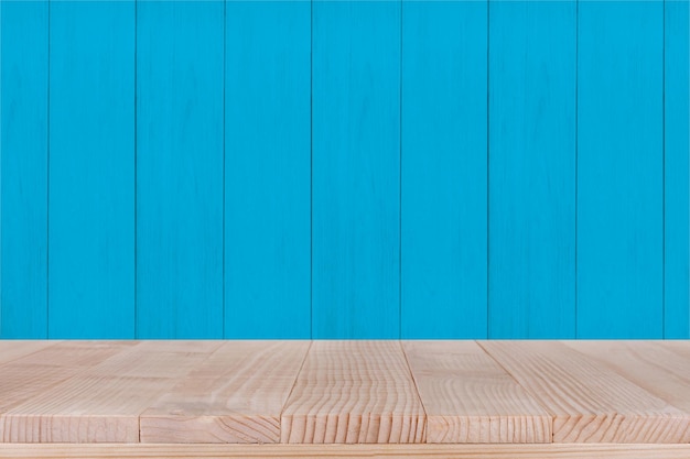 Wood table top on blue wood background