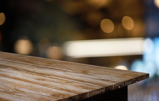 Wood Table Top in Blur Background room interior with empty copy space