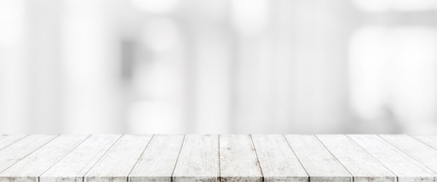 Photo wood table top and blurred abstract background from interior building