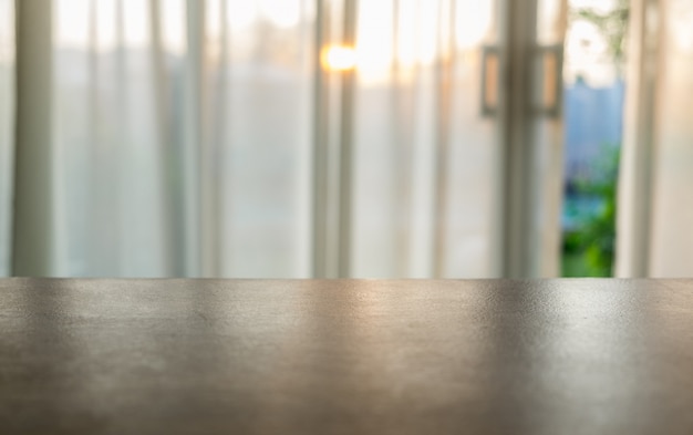 Wood table top on blurred soft curtain