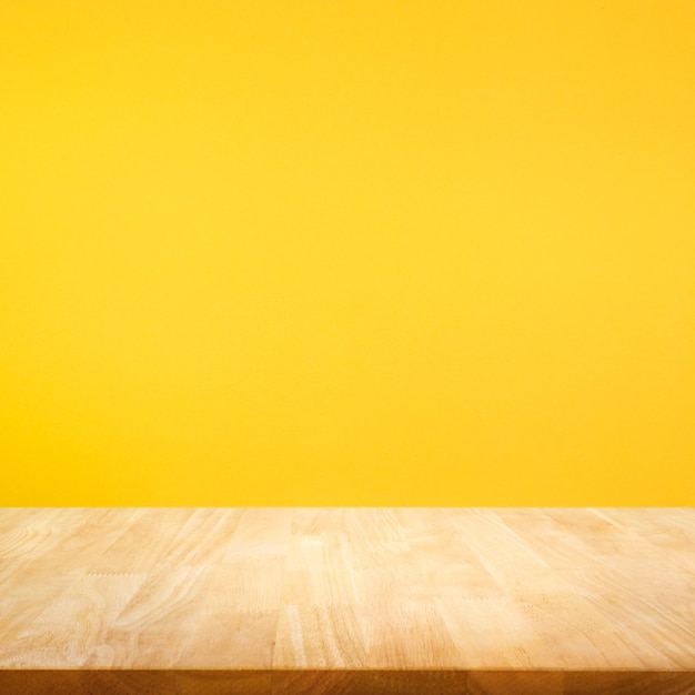 Wood table top on colorful background