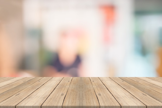 Wood table top on white blurred background,for montage your products