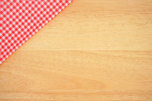 Wood table with classic pink tablecloth