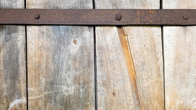 Wood texture as background. Top view of the surface of the table for shooting flat lay. Abstract blank template. Rustic Weathered Wood Shed with Knots and Nail Holes.