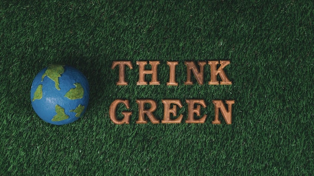 Photo wooden alphabet arranged in ecological awareness campaign with eco icon design on biophilia green grass background to promote environmental protection for greener and sustainable future gyre