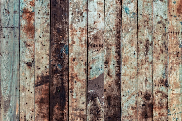 Wooden background of old weathered boards