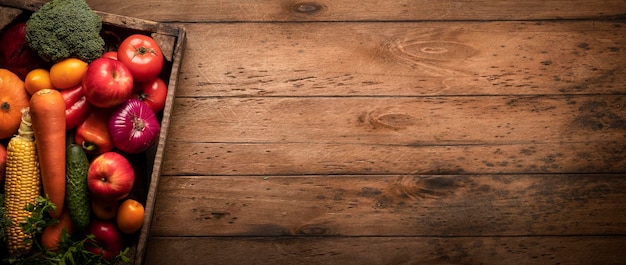 Wooden background raw fresh vegetables on the table panoramic photo for the site header