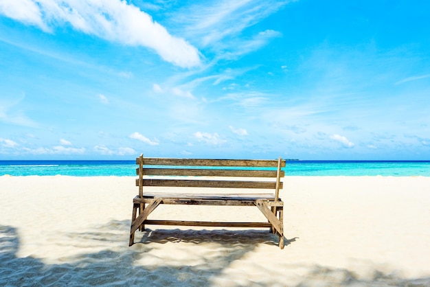 A wooden bench standing near Indian Ocean