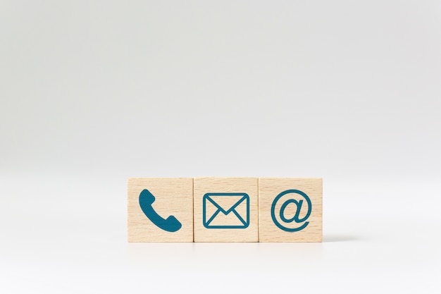 Wooden block cube symbol telephone, email, address