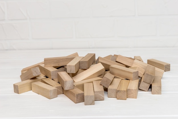 Wooden blocks for tower building on the desk