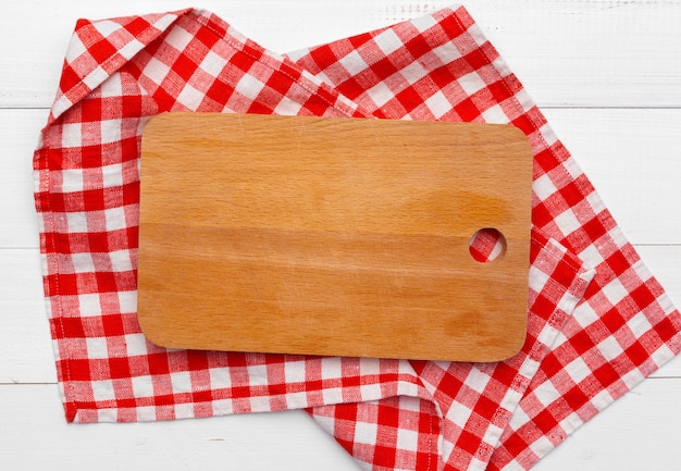 Wooden board stand on tablecloth