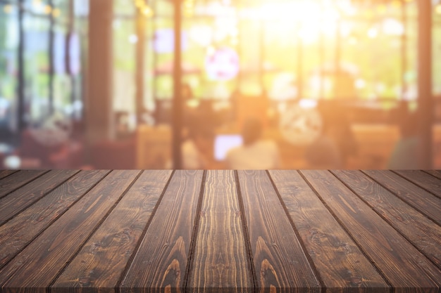 Wooden board or table and abstract blurred background