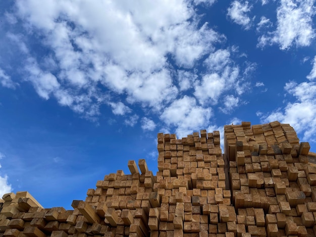 Wooden boards lumber industrial wood timber Pine wood timber stack of natural rough wooden boards on building site Industrial timber building materials