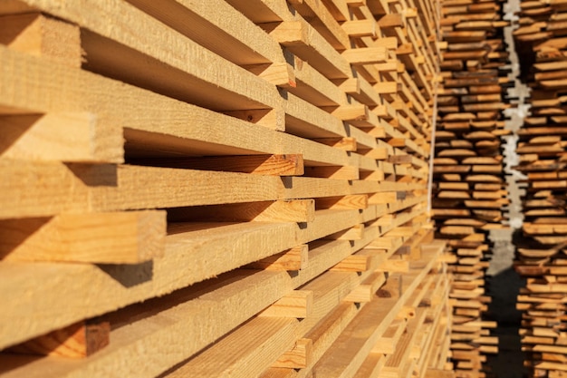 Wooden boards in a sawmill close up Edged board Lumber