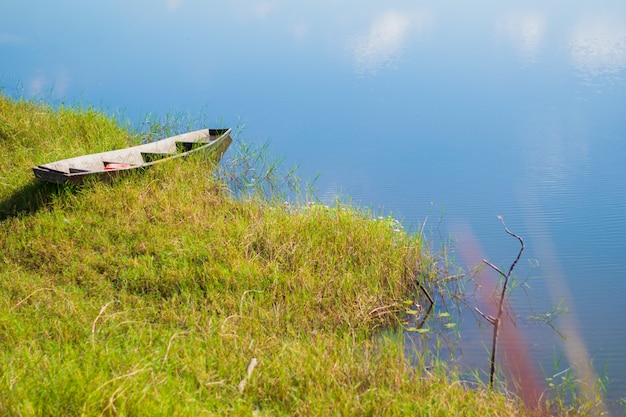 Wooden boat on river view