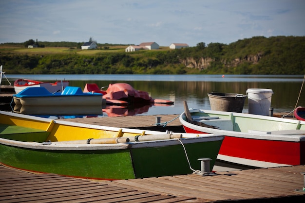 Wooden Boats with Paddles in a Lake